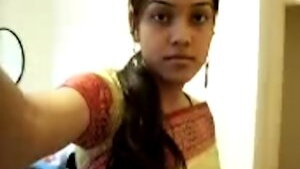 Cute Desi teen strips on cam 